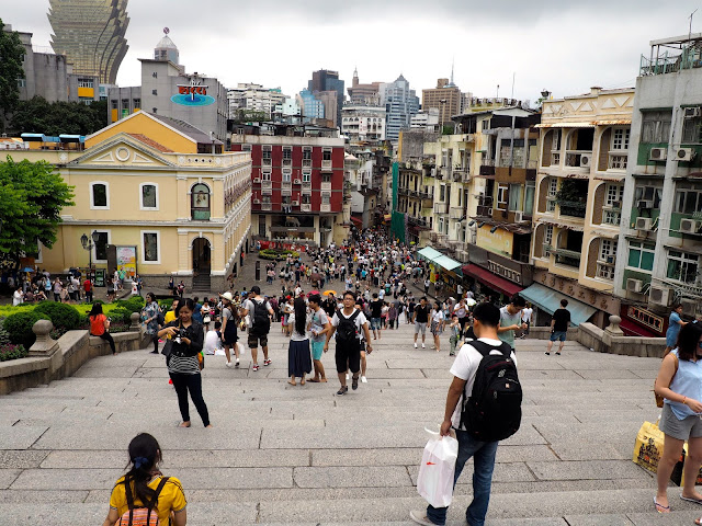 View of Senado Square old town and Grand Lisboa from the top of the stairs at the Ruins of St Paul, Macau