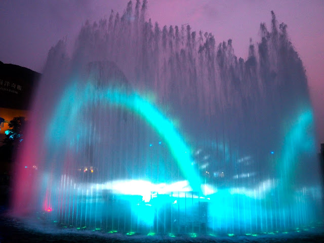 Dragon projection on fountain in Symbio show, Ocean Park