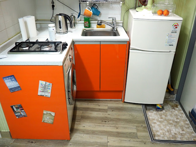 Kitchen area inside studio apartment in Busan, South Korea