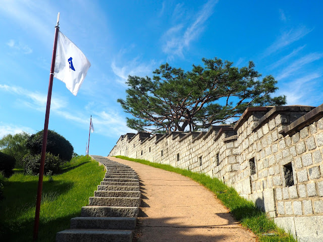 White flags up the steps of Hwaseong fortress walls, around Suwon, Gyeonggi-do, South Korea