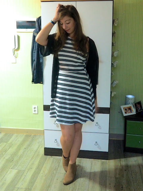 Sheer Fantasy | outfit of black and white striped skater dress, sheer black fabric cardigan, and brown suede heeled ankle boots