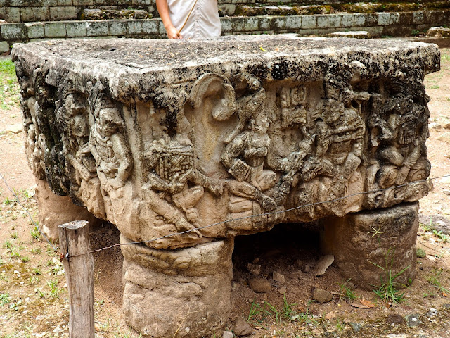 Mayan carvings on a stone table at the temple ruins outside Copan, Honduras