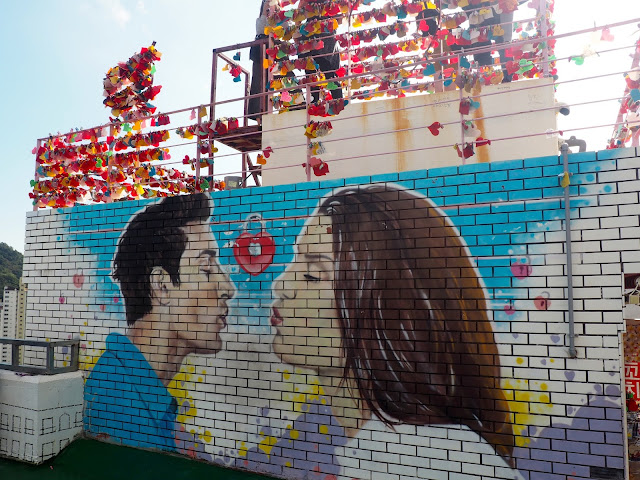 Love locks site and romantic mural in Gamcheon Village, Busan, South Korea
