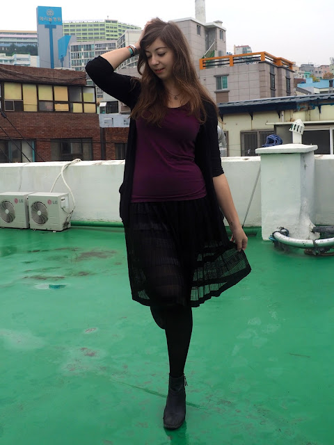 Gossamer Dreams | outfit of plain purple t-shirt, black cardigan, black semi-transparent floaty skirt and black heeled ankle boots