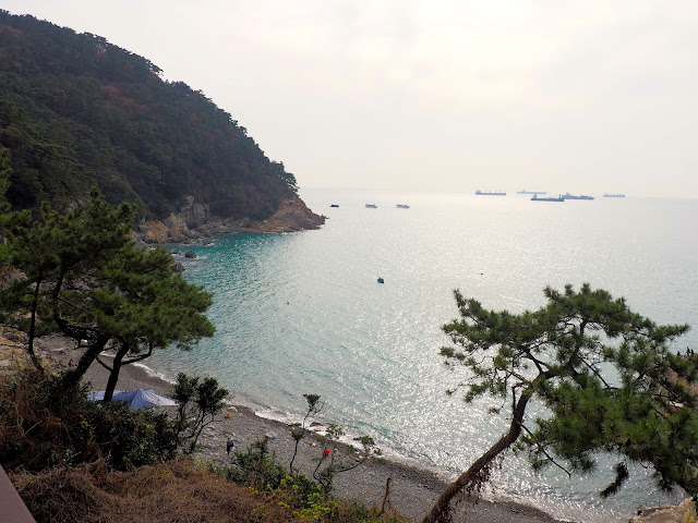 Coastal view overlooking pebble beach in Taejongdae Park, Busan, South Korea