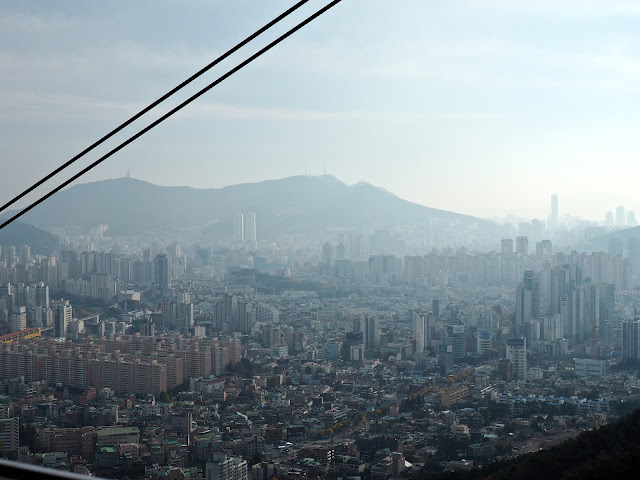 Views of Busan from Geumgang cable car, going up Geumjeongsan Mountain, Busan, South Korea