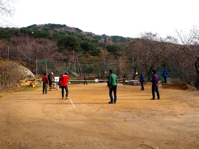 Locals playing games at the weekend in Namman Village on Geumjeongsan Mountain, Busan, South Korea