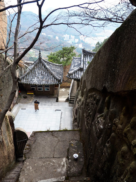 Looking down on the prayer of Seokbulsa Temple, built into the side of Geumjeongsan Mountain, Busan, South Korea