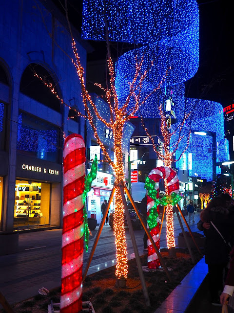 Christmas lights display with overhead banner, trees and candy canes in Nampo, Busan, South Korea