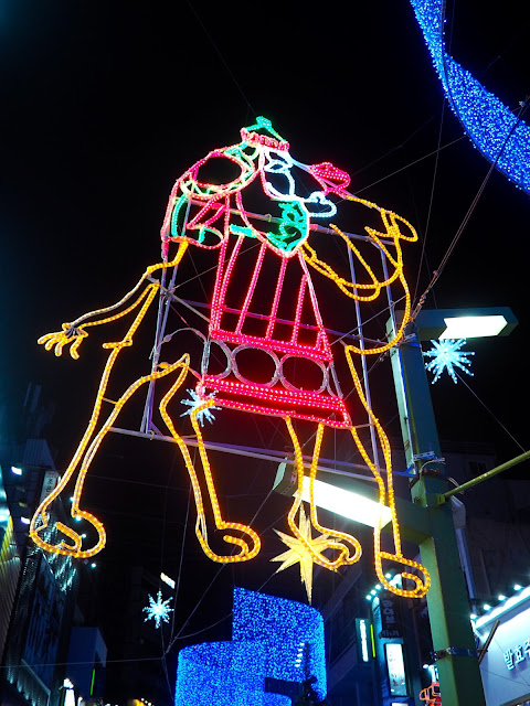 Wise man on a camel as part of the Christmas lights in Nampo, Busan, South Korea