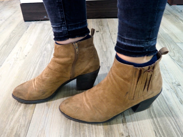 Zig Zag - outfit shoe details of low heeled brown suede ankle boots, worn wit =h grey ragged hem skinny jeans