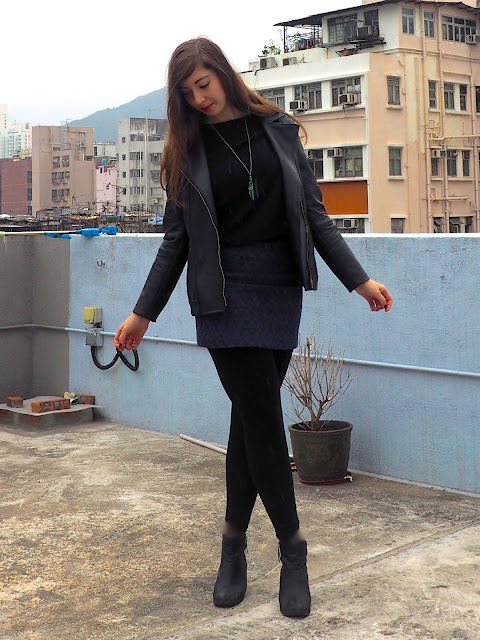 Sparkle | outfit of black top, leather jacket, blue sparkly skirt, black leggings & heeled ankle boots