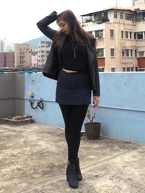 Sparkle | outfit of black top, leather jacket, blue sparkly skirt, black leggings & heeled ankle boots