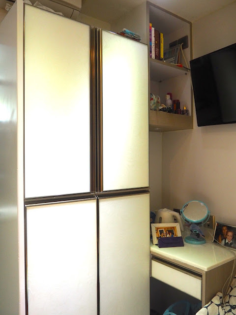 Wardrobe and table area of my studio apartment in Sham Shui Po, Kowloon, Hong Kong