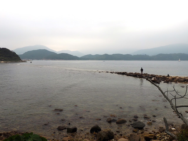 Natural bridge under the ocean by Kiu Tsui beach, Sharp Island, Hong Kong