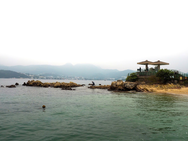 Rocks by the pavilion next to Kiu Tsui pier and beach on Sharp Island, Hong Kong