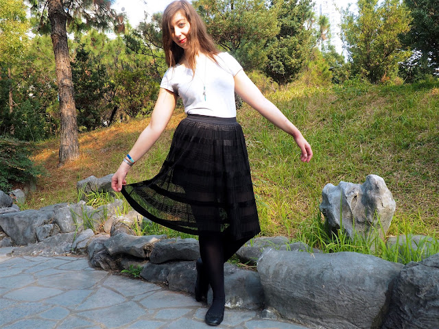 Balletic - outfit of plain grey t-shirt, long, floaty, sheer black skirt, with black tights and ballet flats