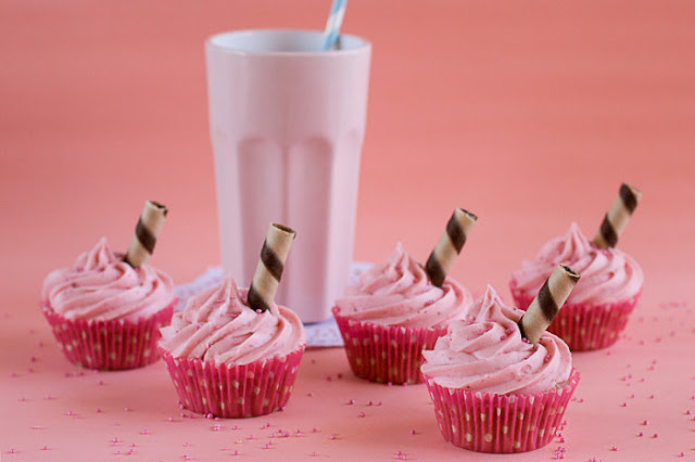 Pink milkshake and cupcakes
