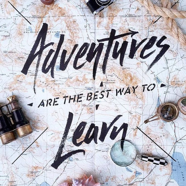 Travel quote "Adventures are the best way to learn" on a map background