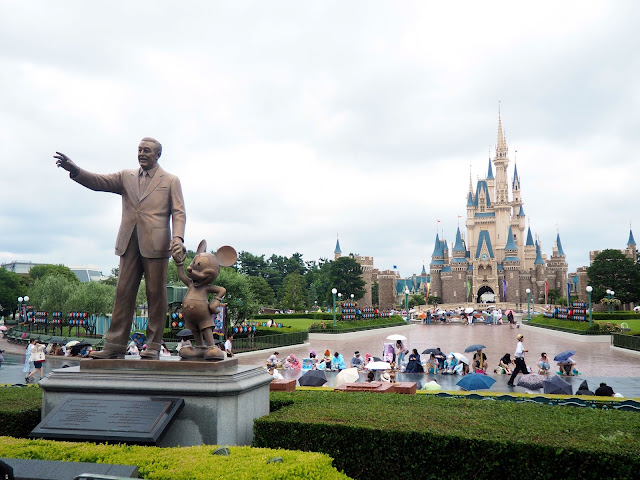 Walt Disney & Mickey Mouse statue in front of Cinderella Castle, Tokyo Disneyland, Japan