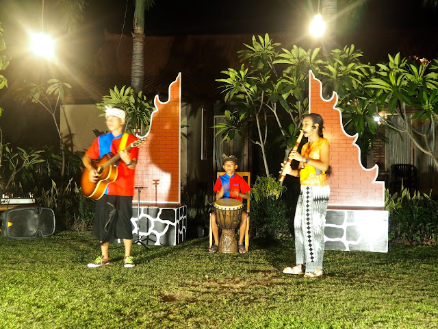 Local children performing Balinese music in Kubuku hotel, Pemuteran, Bali, Indonesia