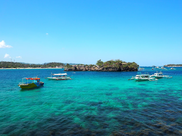 Boats in the ocean near Boracay, Philippines