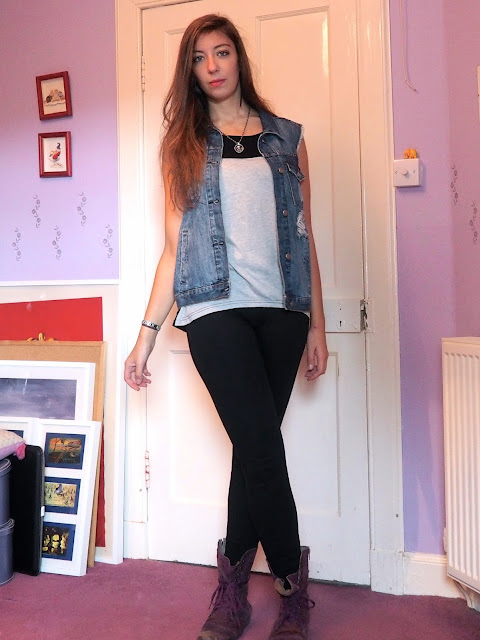 Rock 'n' Roll - grunge rock outfit of ripped denim waistcoat, loose grey t-shirt, black skinny jeans, and purple combat boots