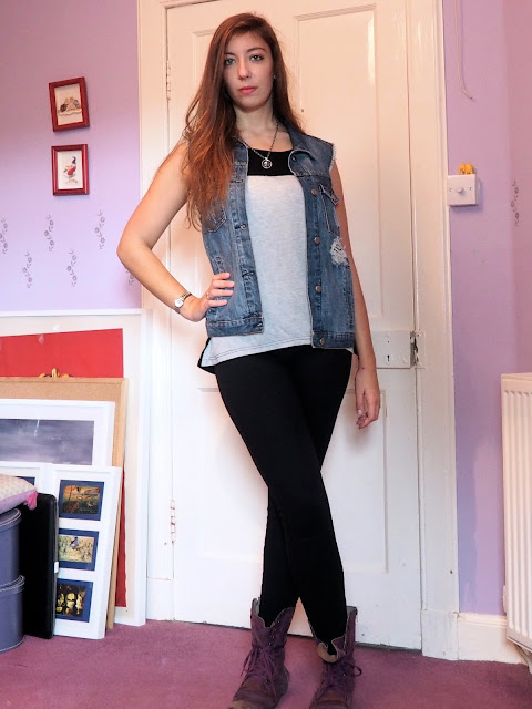 Rock 'n' Roll - grunge rock outfit of ripped denim waistcoat, loose grey t-shirt, black skinny jeans, and purple combat boots