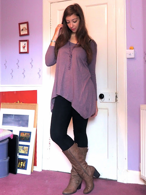 Lilac Dreams | outfit of long, tunic style purple top, black leggings, and tall, high heeled brown leather boots