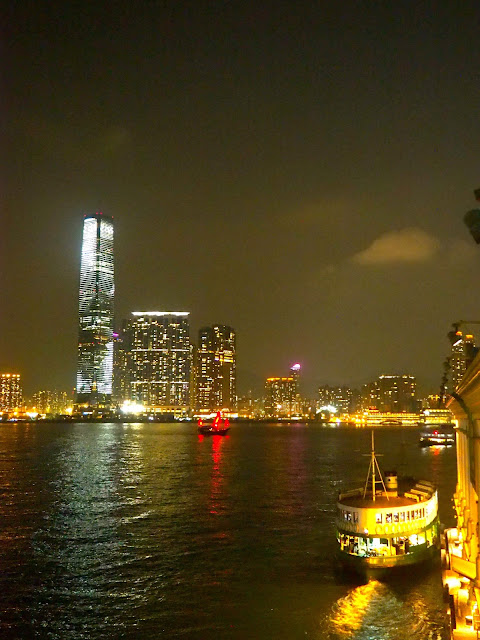 View of ICC and Star Ferry at night from Hong Kong