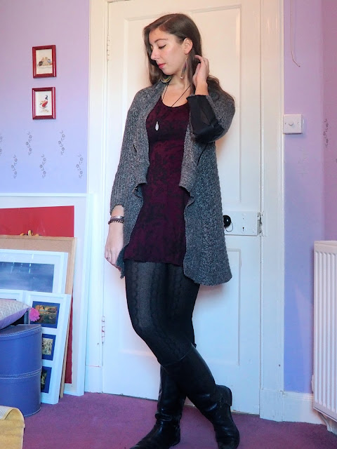 Bundled Up - outfit of short, purple and black floral print dress, chunky grey cardigan, woollen tights, and tall black riding boots