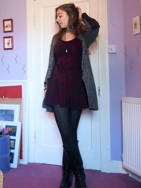 Bundled Up - outfit of short, purple and black floral print dress, chunky grey cardigan, woollen tights, and tall black riding boots