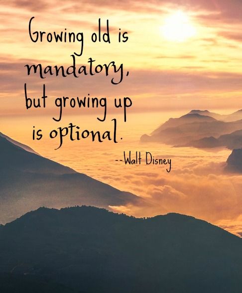 Walt Disney quote - growing old is mandatory but growing up is optional - on sunset mountain background