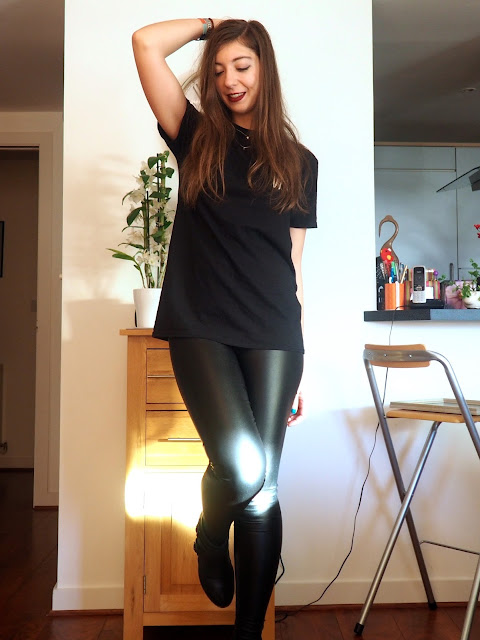 Leather Look | outfit of black Deaf Havana t-shirt with skull print, faux black leather leggings, and black high heeled ankle boots