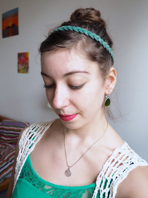 Tinkerbell Disneybound outfit jewellery details of green braid headband, green jewel earrings & silver tree of life necklace