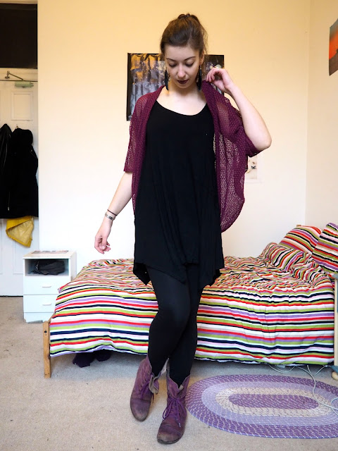 Pull the Lever | Disneybound Yzma outfit of black slouch dress, leggings, pink knit cardigan, and purple combat boots