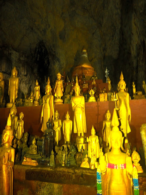 Buddha cave on shores of Mekong River, Laos