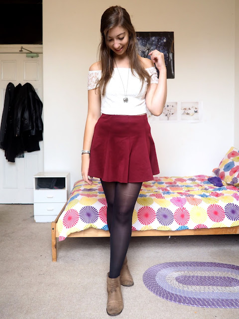 Disneybound outfit inspired by Jane Porter from Tarzan, of white lace crop top, burgundy red skater skirt, and brown suede ankle boots
