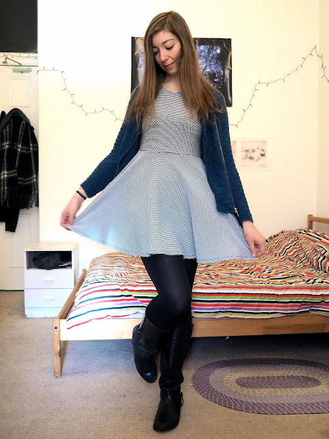 Back to the Start - outfit of blue and white knit dress, blue sparkly cardigan jumper and tall black leather boots
