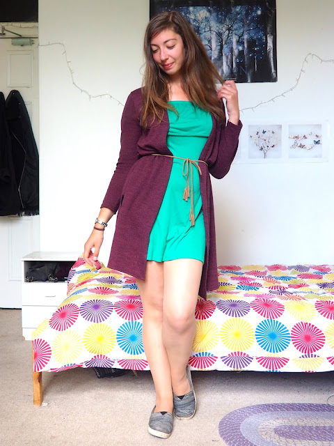 Picnic Weather - outfit of green dress & purple cardigan belted at waist, with grey Toms