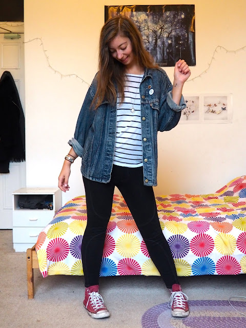 Vintage - outfit of second hand thrifted blue denim jean jacket, white striped top, black leggings & red Converse