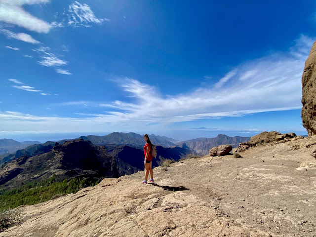 Views of the mountains and pine trees, and Tenerife on the horizon, from the Roque Nublo, Gran Canaria, Spain