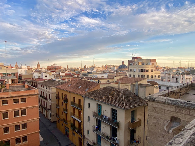 View of the historic old town at dusk from the Torres de Quart, Valencia, Spain