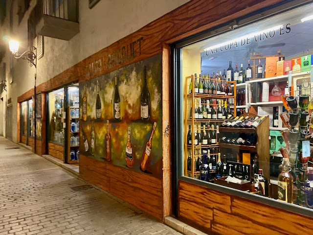 Street art on a wine shop in the old historic centre of Valencia, Spain
