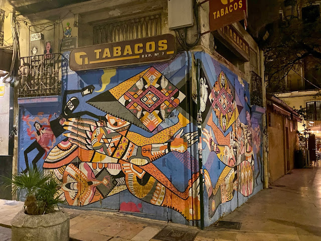 Street art at night in the old historic centre of Valencia, Spain