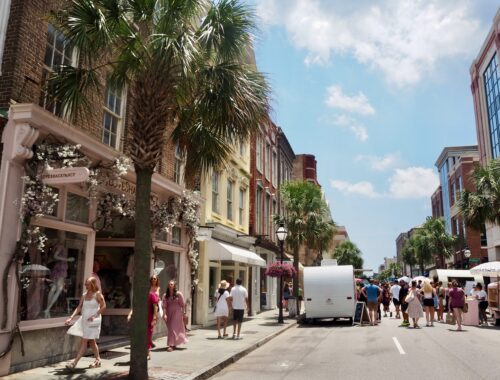 Highlights of Charleston, SC - feature photo - colourful buildings, food trucks and palm trees in the sun on King Street