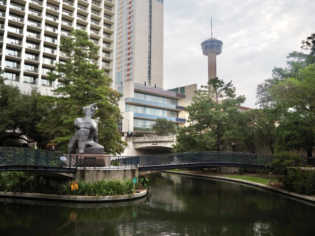 Highlights of San Antonio - second feature photo - sculpture by the River Walk with the Tower of the Americas in the background