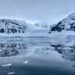 Antarctica Expedition, Western Peninsula - feature photo - snowy mountain and glacier scenery overlooking icy water near Danco Island
