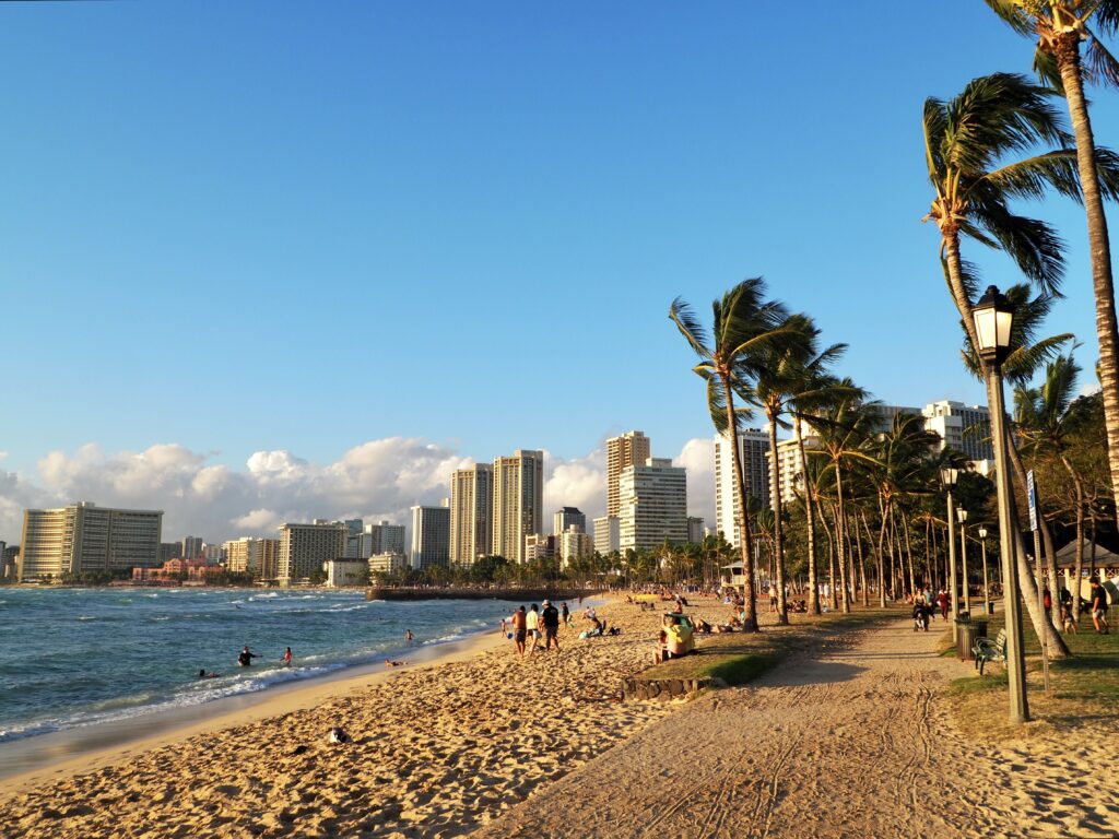 Hawaii short break - second feature photo - palm trees and tall buildings along Waikiki beach on Oahu
