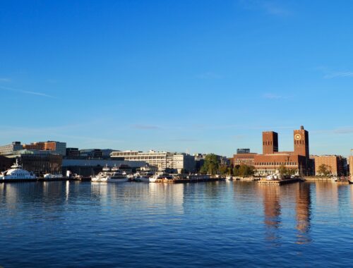 A Weekend in Oslo - feature photo - Oslo harbour waterfront featuring ferries and the Rådhus city hall, Norway